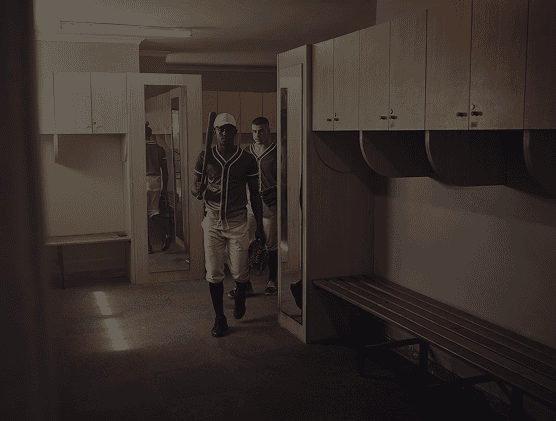 Team members in uniform in locker room