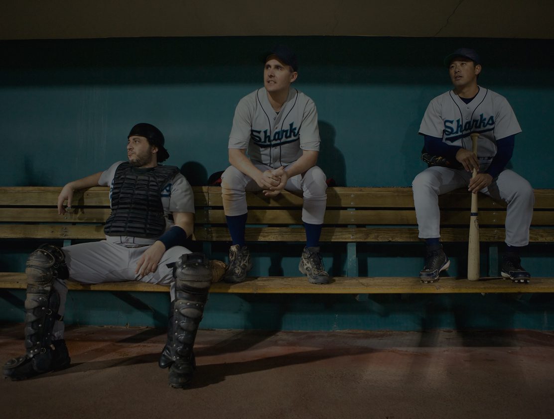 Baseball players sitting on a bench